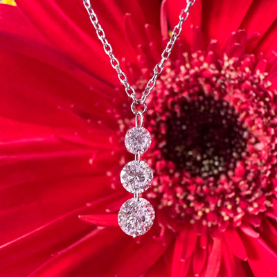 Apparel & Accessories > Jewelry > Necklaces Floating Diamonds Drop Pendant 14K White Gold Necklace Pierce Custom Jewelers